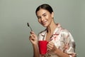 Happy morning. Young cheerful woman drinking coffee, portrait Royalty Free Stock Photo