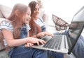 Happy mother with adorable little girl with laptop Royalty Free Stock Photo