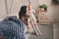 Happy mother and baby playing at home in bedroom. Cozy family lifestyle Royalty Free Stock Photo