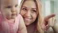 Happy mother with baby. Smiling woman embrace her kid Royalty Free Stock Photo