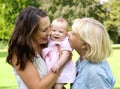 Happy mother with child and grandmother outdoors Royalty Free Stock Photo