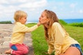 Happy mother with child have a fun on grass lawn Royalty Free Stock Photo