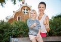 Happy mother and child showing thumbs up in Park Guell Royalty Free Stock Photo