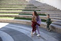 Happy mother with children in fashionable clothes family look in a park Royalty Free Stock Photo