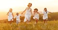 Happy mother with children having fun in countryside Royalty Free Stock Photo