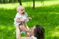 Happy mother and cute baby girl playing outdoor Royalty Free Stock Photo