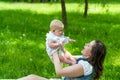 Happy mother and cute baby girl playing outdoor Royalty Free Stock Photo