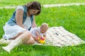 Happy mother and cute baby girl playing outdoor Royalty Free Stock Photo