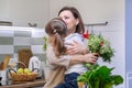 Happy mother and daughter child with spring bouquet Royalty Free Stock Photo