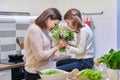 Happy mother and daughter child with spring bouquet Royalty Free Stock Photo