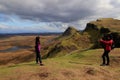 Happy mother and and daughter enjoying photographing beautiful view at the Quiraing, Scotland Royalty Free Stock Photo