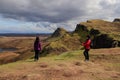 Happy mother and and daughter enjoying photographing beautiful view at the Quiraing, Scotland Royalty Free Stock Photo