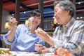 Happy mother and daughter having fun in  restaurant Royalty Free Stock Photo