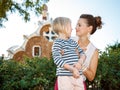 Happy mother and daughter having fun time in Park Guell Royalty Free Stock Photo