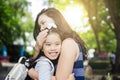 Happy mother and daughter laughing together outdoors Royalty Free Stock Photo