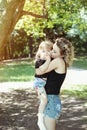 Happy mother with daughter similar look tender kiss Royalty Free Stock Photo