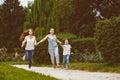 Happy Mother with daughter and son running on Royalty Free Stock Photo