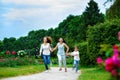 Happy Mother with daughter and son running on Royalty Free Stock Photo