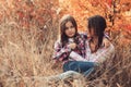 Happy mother and daughter on the walk on summer field. Family spending vacation outdoor, lifestyle capture Royalty Free Stock Photo