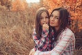 Happy mother and daughter on the walk on summer field. Family spending vacation outdoor, lifestyle capture Royalty Free Stock Photo