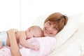 Happy mother embracing her newborn baby Royalty Free Stock Photo