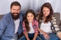 happy mother father and daughter make selfie sit on sofa together, family day Royalty Free Stock Photo