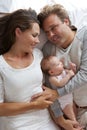 Happy mother and father holding newborn child Royalty Free Stock Photo