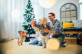 Mother, father and baby holding bauble Royalty Free Stock Photo