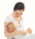 Happy mother feeding breast her baby over white Royalty Free Stock Photo