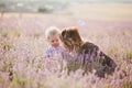 Happy mother and her little son posing in a lavender field Royalty Free Stock Photo