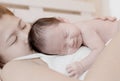 Mother and her Newborn Baby Kissing and hugging Royalty Free Stock Photo