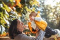 Happy mother and her son on nature smiling, play and embracing. Love and tenderness. International hugging day Royalty Free Stock Photo