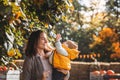 Happy mother and her son on nature smiling, play and embracing. Love and tenderness. International hugging day Royalty Free Stock Photo