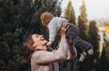 Happy mother and her son on nature smiling, play and embracing. Love and tenderness. International hugging day Royalty Free Stock Photo