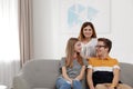 Happy mother with her teenager daughter and son Royalty Free Stock Photo