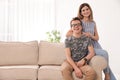 Happy mother and her teenager son at home Royalty Free Stock Photo