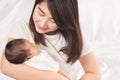 Happy mother holding adorable child baby boy Royalty Free Stock Photo