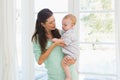 Happy mother holding baby boy Royalty Free Stock Photo