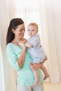 Happy mother holding baby boy Royalty Free Stock Photo