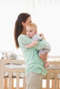 Happy mother holding baby boy Royalty Free Stock Photo