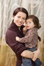 Happy mother holding child in arms Royalty Free Stock Photo