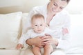 Happy mother holding her lovely smiling baby Royalty Free Stock Photo