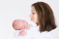 Happy mother holding her sleeping newborn baby Royalty Free Stock Photo