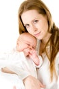 Happy mother holding a young baby girl Royalty Free Stock Photo