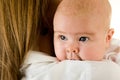 Happy mother holding a young baby girl Royalty Free Stock Photo