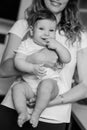 Happy mother holding a baby in her arms Royalty Free Stock Photo