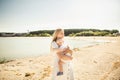 Happy mother huges baby. Mother holds child in her arms, baby hugging mom, close-up Royalty Free Stock Photo