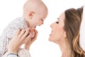 Happy mother hugging her adorable baby son. Happy family. Mother and newborn child portrait. Royalty Free Stock Photo