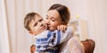 Happy mother hugging and kissing her little son Royalty Free Stock Photo