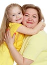 A happy mother hugs her beloved daughter. Royalty Free Stock Photo